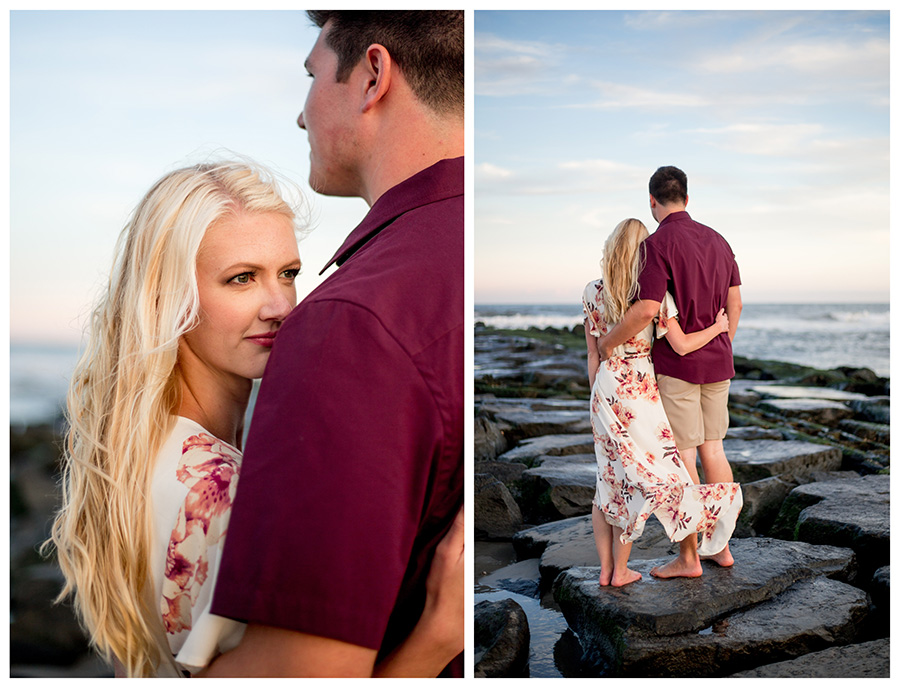 Couple at sunset on jetty in ocean city for their engagement session