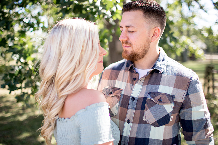 mint and plaid wardrobe choice for engagement pictures