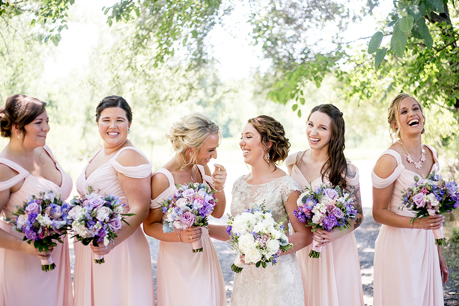 bride laughing with her friends 