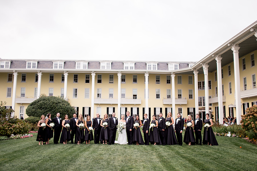wedding party dressed in all formal black attire