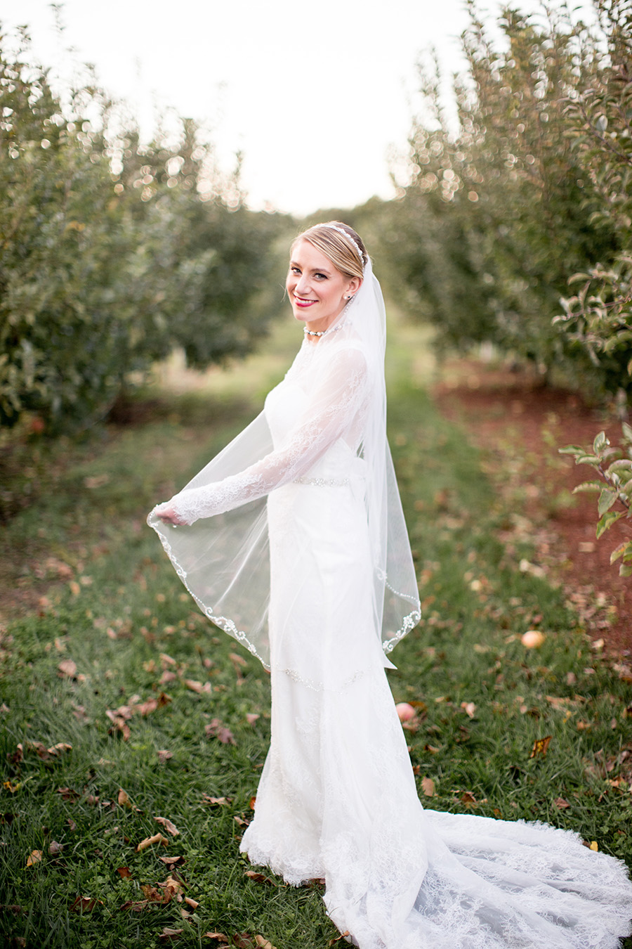 sunset wedding portraits in the apple orchard at Hill Creek Farms