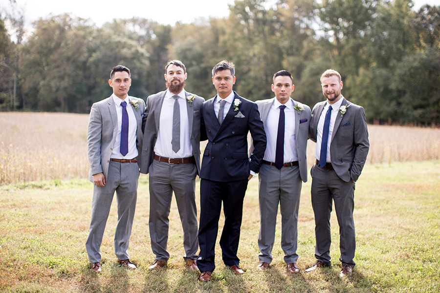 groomsmen with groom at the farm before the wedding ceremony