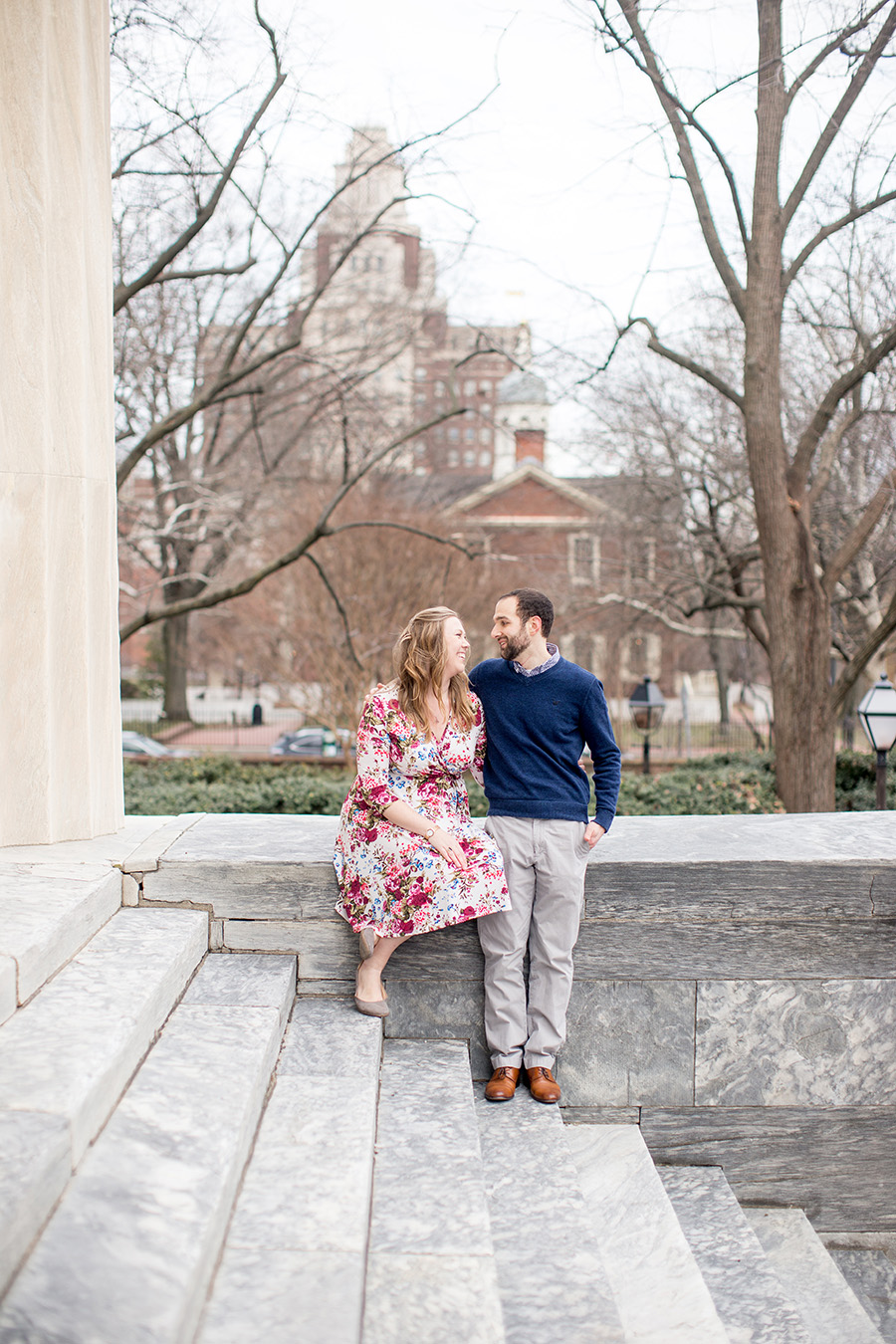 couple smiling at each other during their engagement session