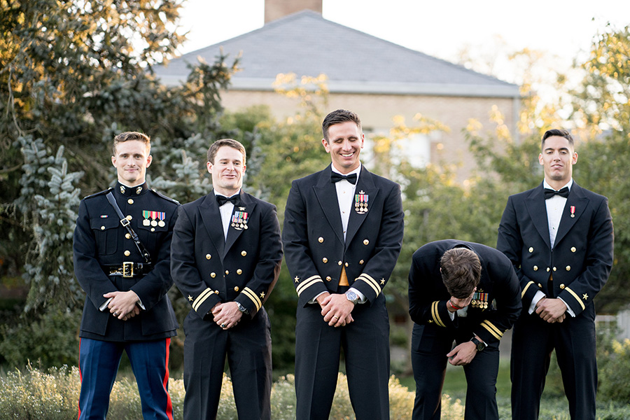 groom laughing with his friends at dupont country club wedding