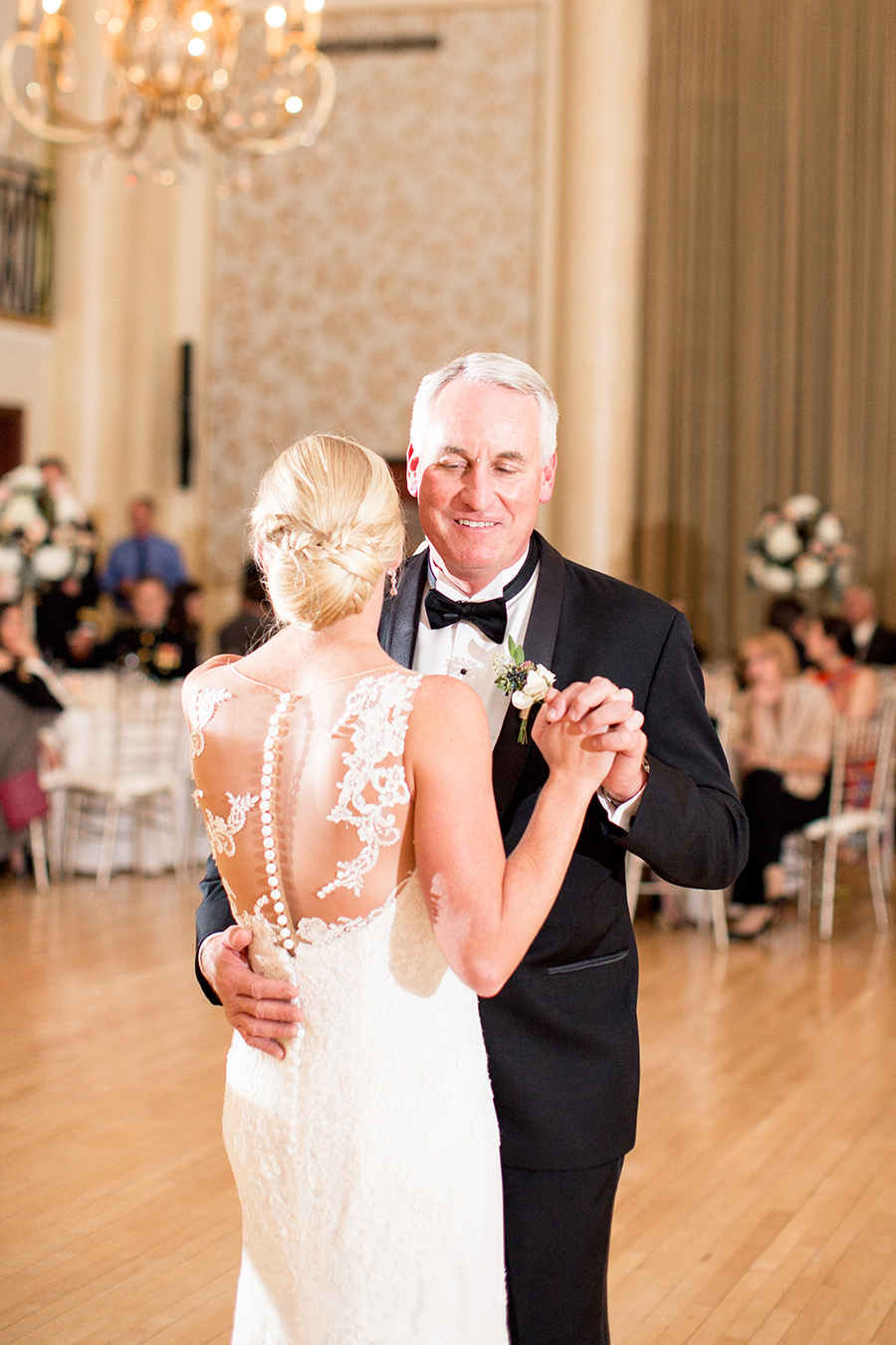 dupont country club wedding where bride dances with her dad in the ballroom 