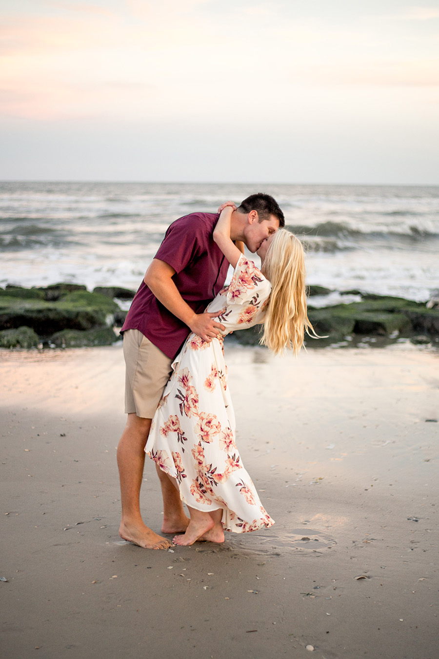 sunset kiss for engagement photos in ocean city NJ