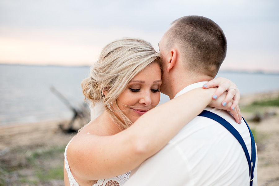 sunset wedding portraits on the beach at the inn at salem country club