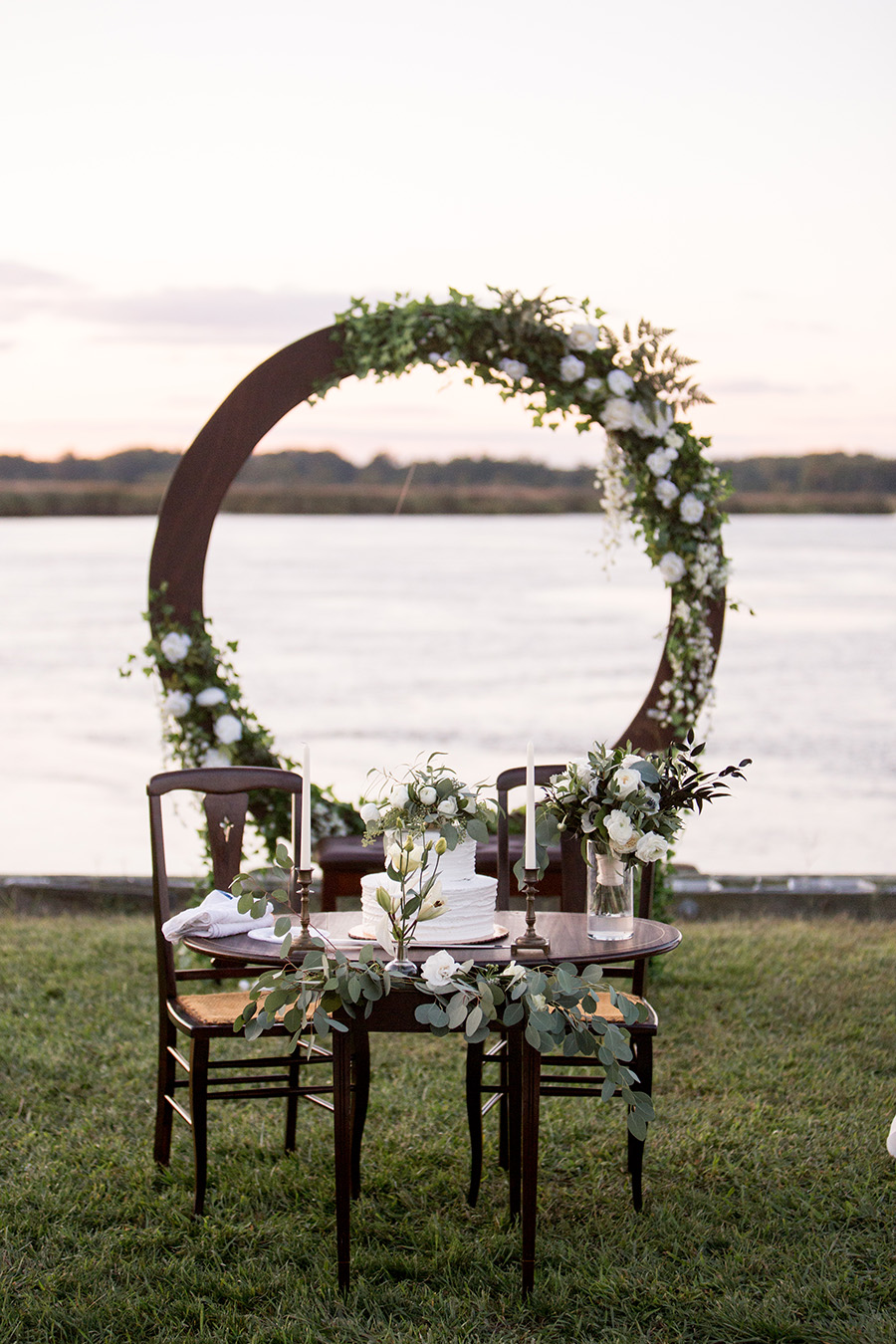sweetheart table with white and green florals