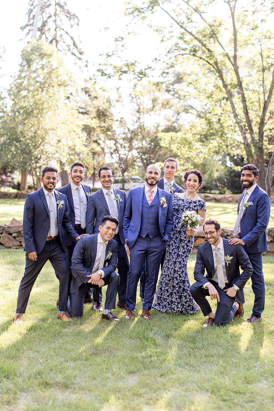 crazy groomsmen pose for a picture