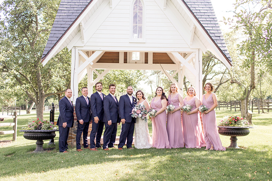Wedding party near the bell tower at ironstone ranch