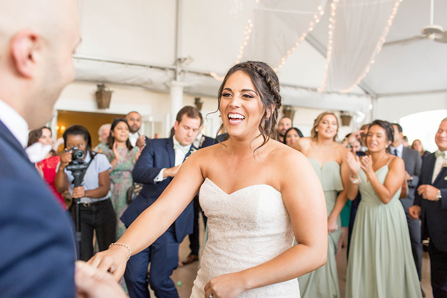 wedding couple have fun dancing at reception