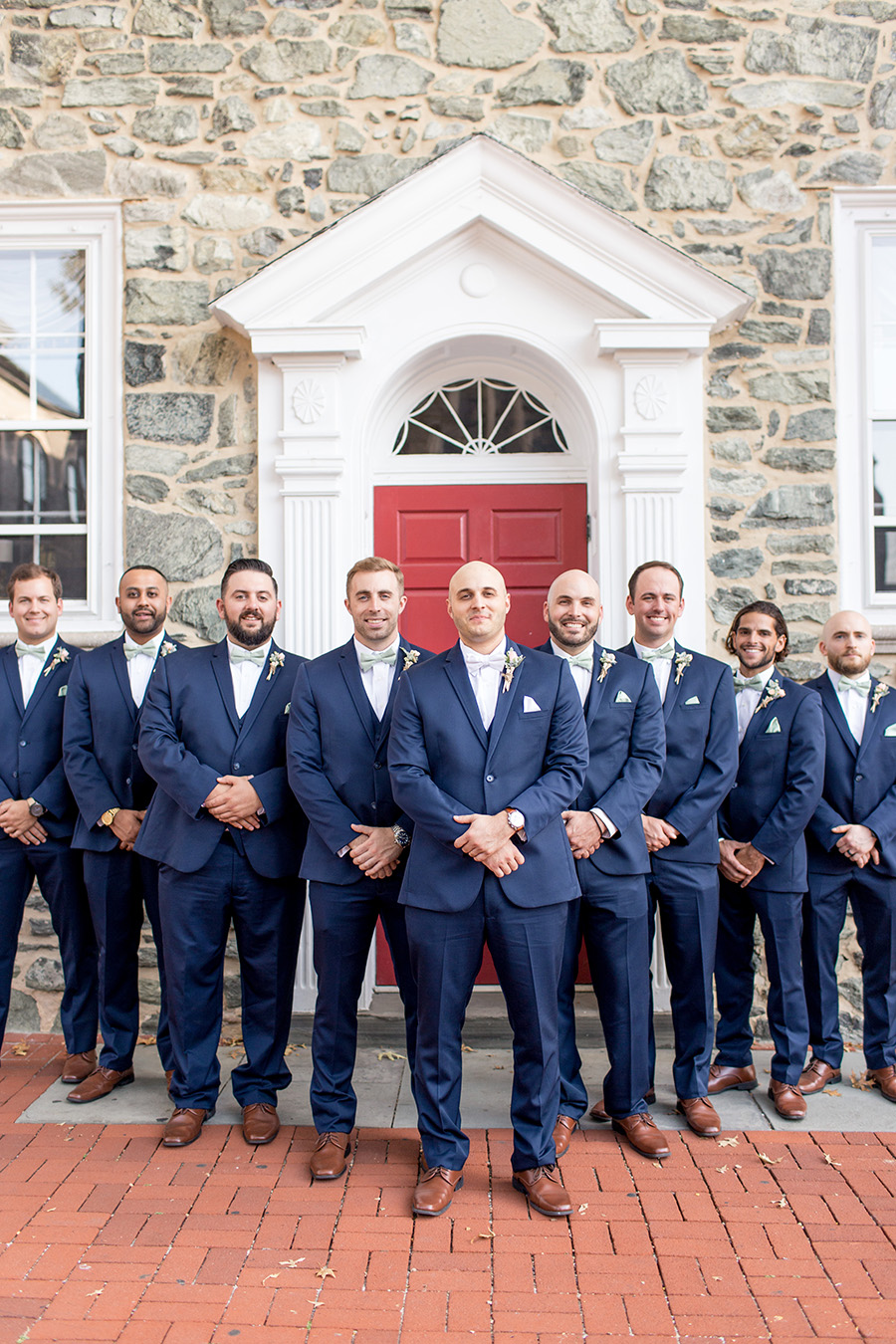 groomsmen dressed in navy for wedding day near penn oaks