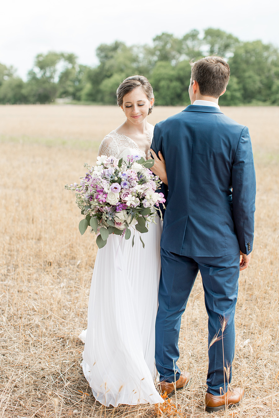 wedding portraits in an open field