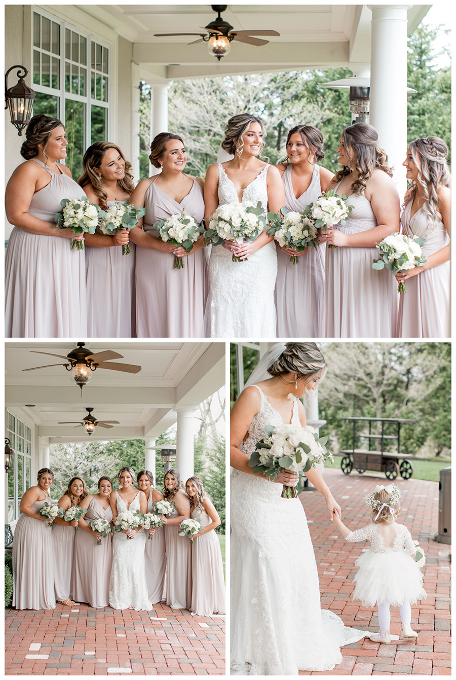 bride and her bridesmaids in floor length, neutral biscotti colored bridesmaid dresses and white flowers