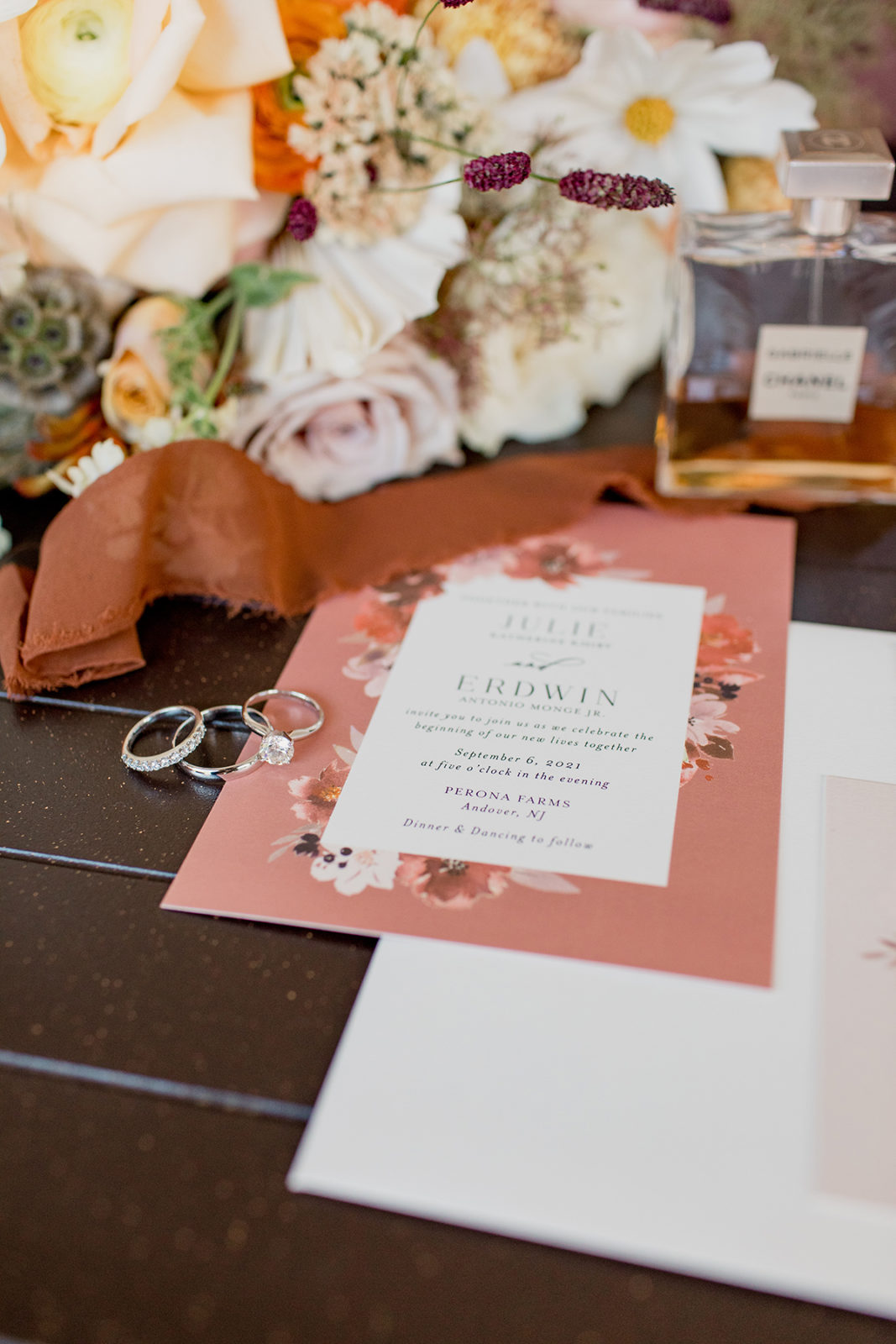 rust and blush stationary and florals 