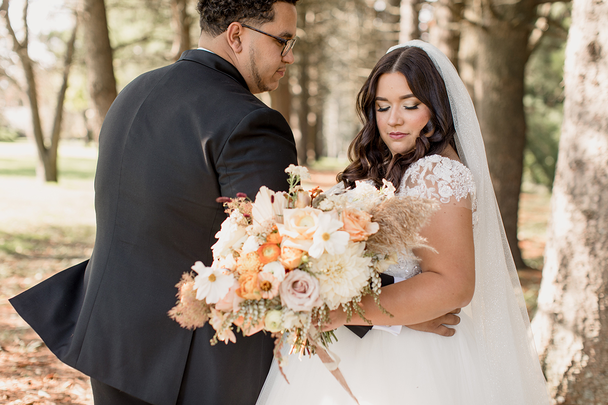 fall wedding bouquet with pampas grass and orange and rust florals