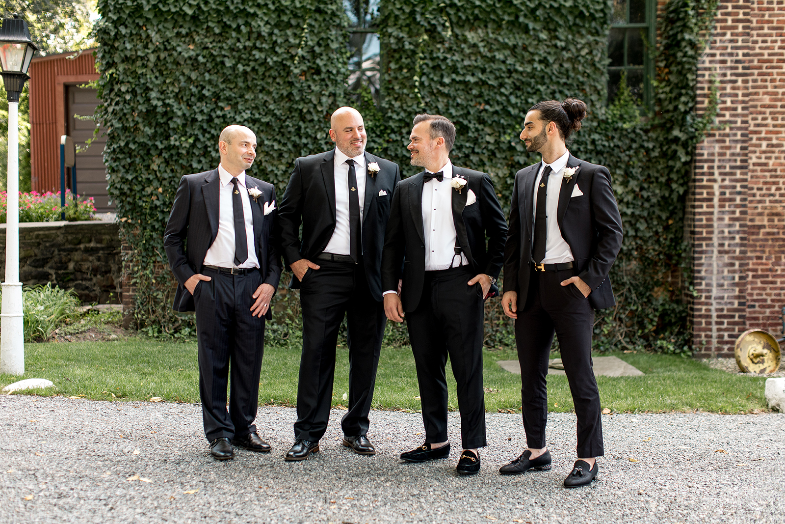 groom and his groomsmen in classic black tuxes